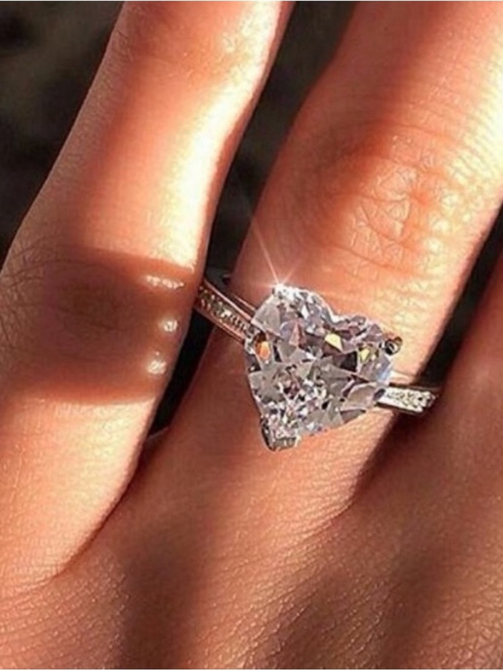 Heart-Cut Solitaire Engagement Ring in Silver with Clear Stone